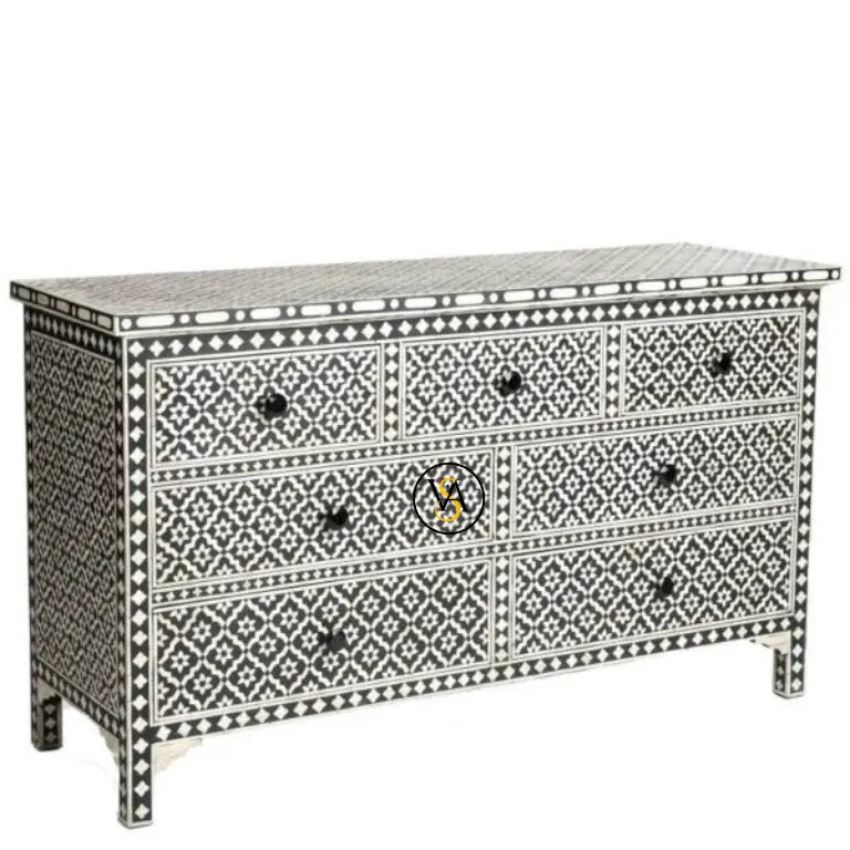 Angled view of black bone inlay 7-drawer chest featuring handcrafted floral detailing