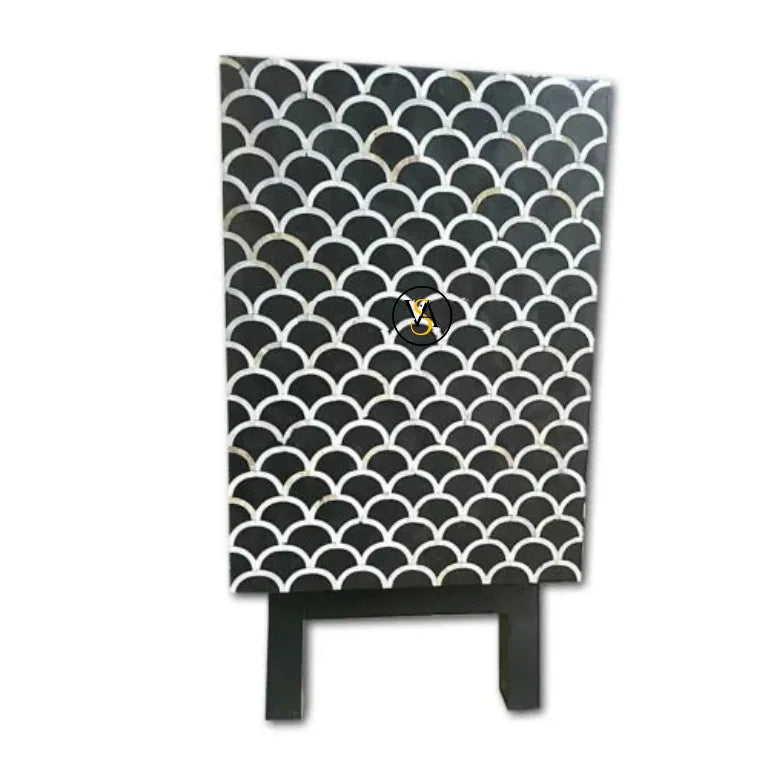 Detailed side view of black mother of pearl sideboard with fish scale inlay
