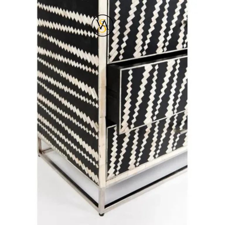Black and white patterned cabinet with chrome frame on a white background
