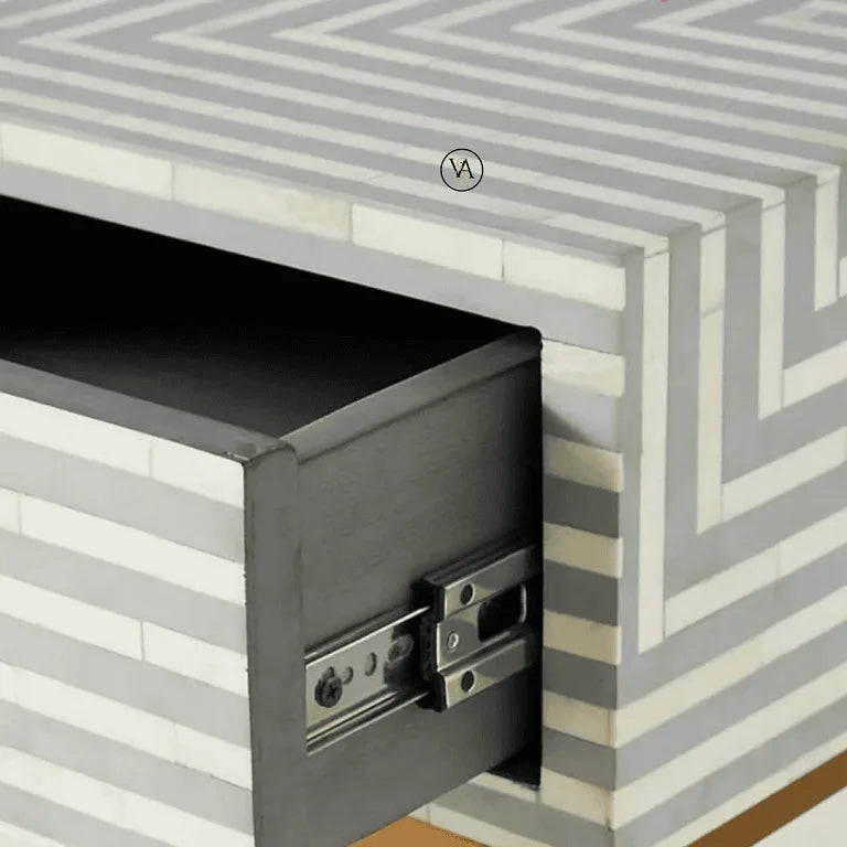 Close-up view of bone inlay drawer with soft-close rail mechanism – handcrafted detail