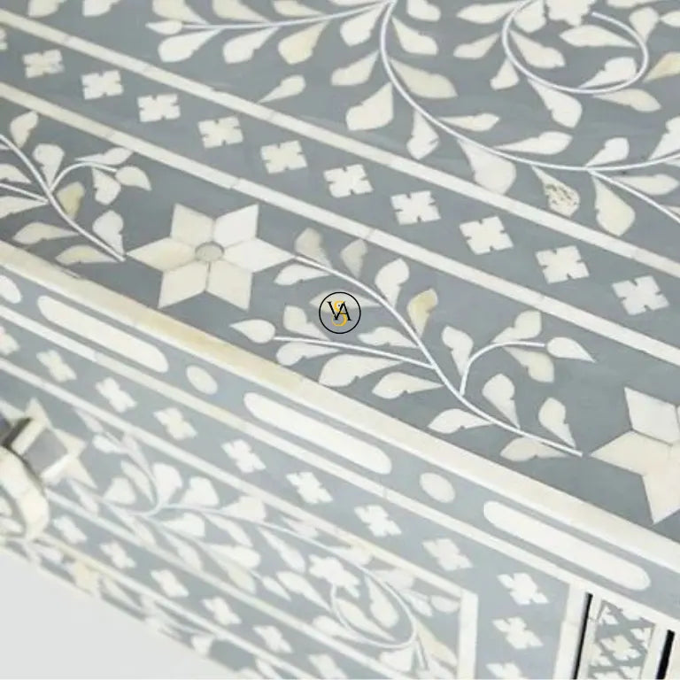 Close-up view of Bone Inlay Floral Coffee Table With Drawer in gray