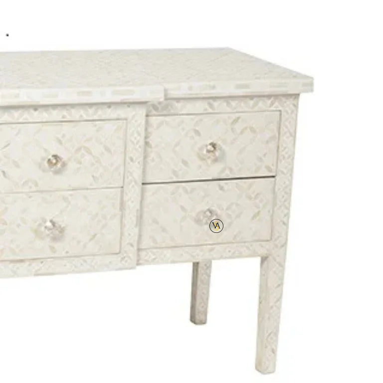 Close up detail of geometric pattern on handmade bone inlay white console drawer