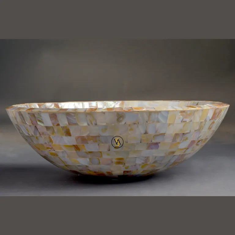 Side profile of glossy handcrafted golden wash basin