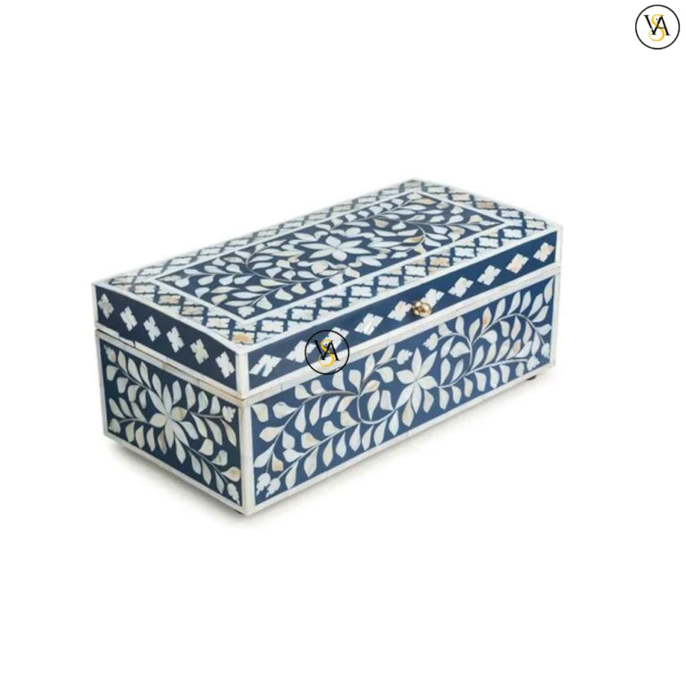 Angled view of handcrafted jewelry box with white floral inlay