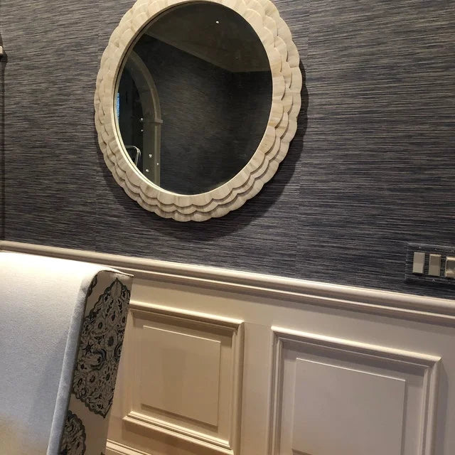 White beveled Bone Inlay Entryway Mirror mounted on textured wall with paneling below.