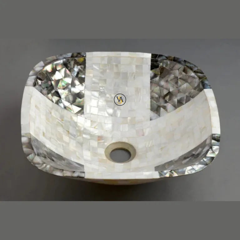 Close-up detail of handmade mother of pearl plus design wash basin