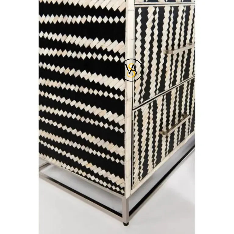 Black and white patterned chest of drawers with a brand logo on a white background