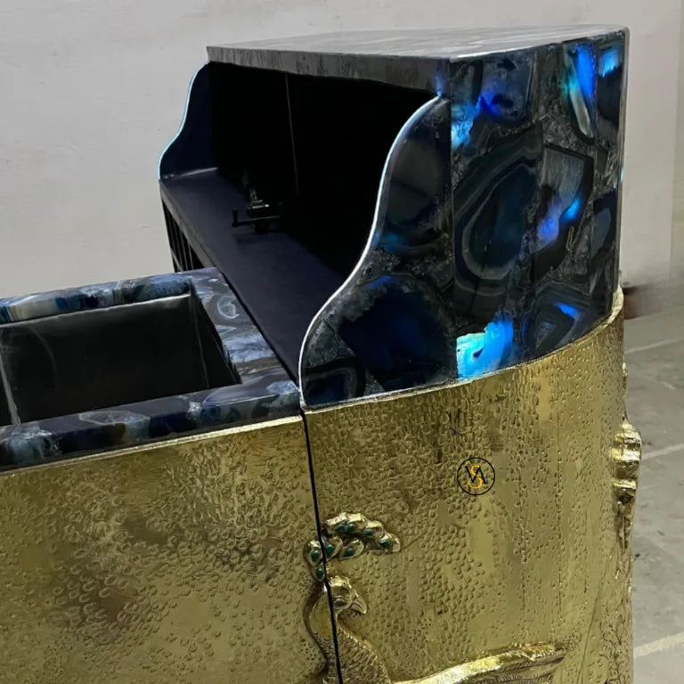 Side view of Brass Embossed Peacock Bar Cabinet with royal blue agate top