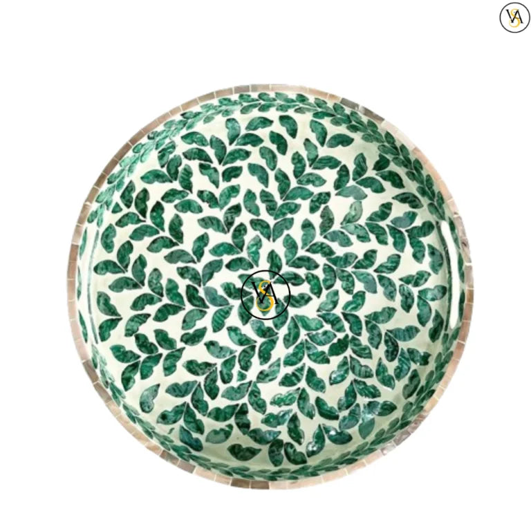 Top view of round mother of pearl inlay tray with floral leaf design
