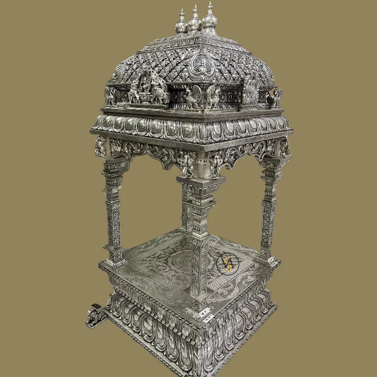 Side angle showcasing the detailed pillars and dome carvings of the temple.