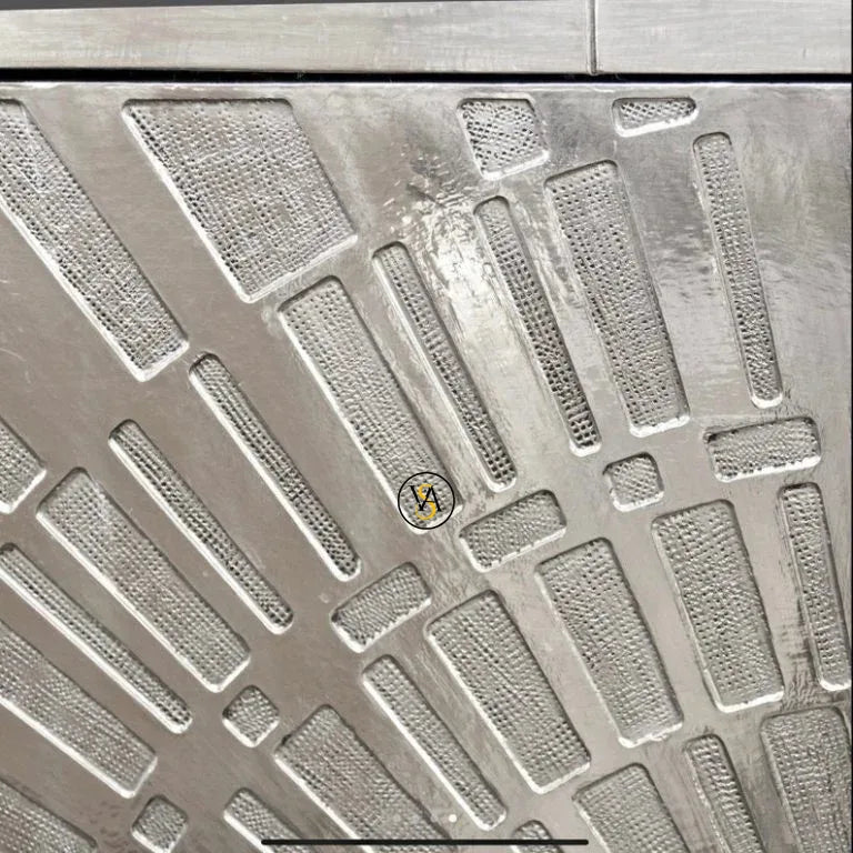 Silver Carved Sideboard with starburst pattern design closeup