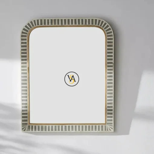 Bone Inlay decorative mirror with striped frame on a light gray background