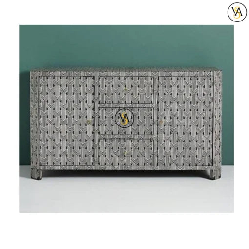 Decorative sideboard with geometric pattern against a green background