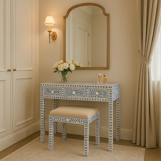 Dressing table with cushioned stool placed in elegant room interior