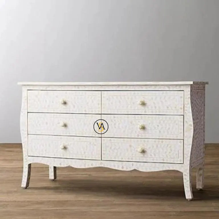 Side view of Bone Inlay White 6 Chest Dresser against a gray wall