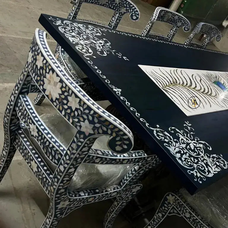 Bone inlay dining table white patterns on a royal blue background