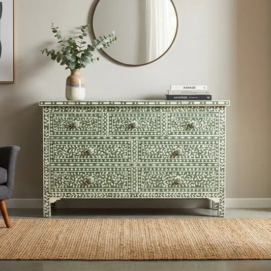 Bone inlay chest dresser with green floral design in living room