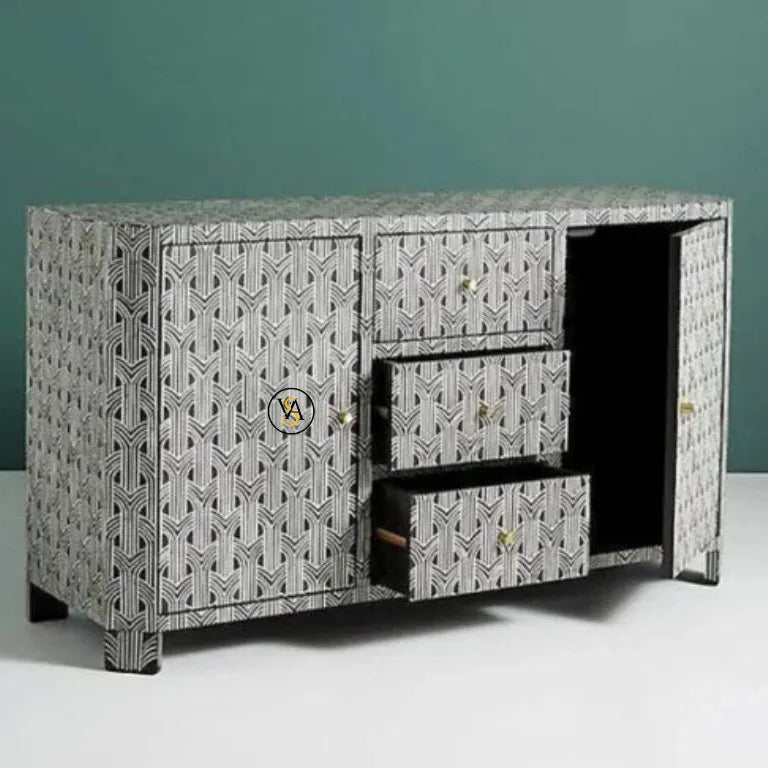 Decorative sideboard with geometric pattern on a white surface against a green wall