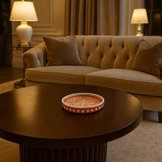 Bone inlay orange tray styled on wooden table in living room