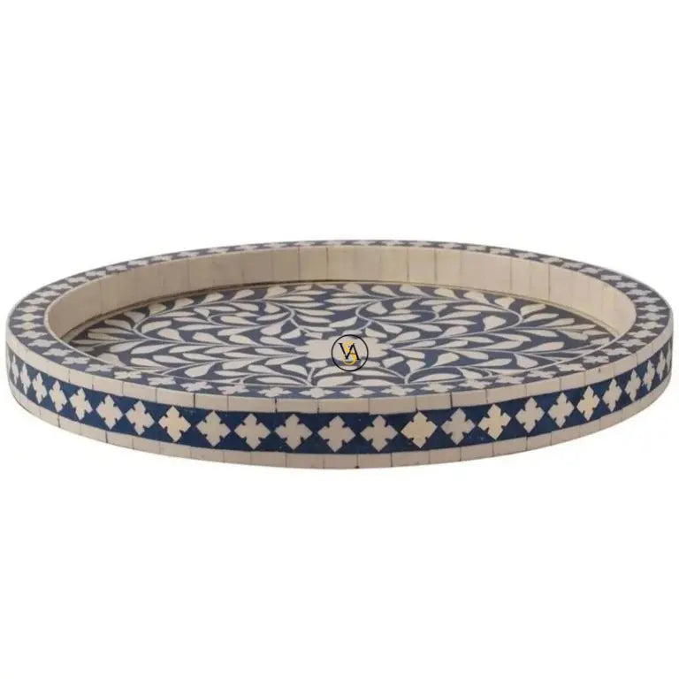 Decorative bone inlay round tray with blue and white pattern on a white background