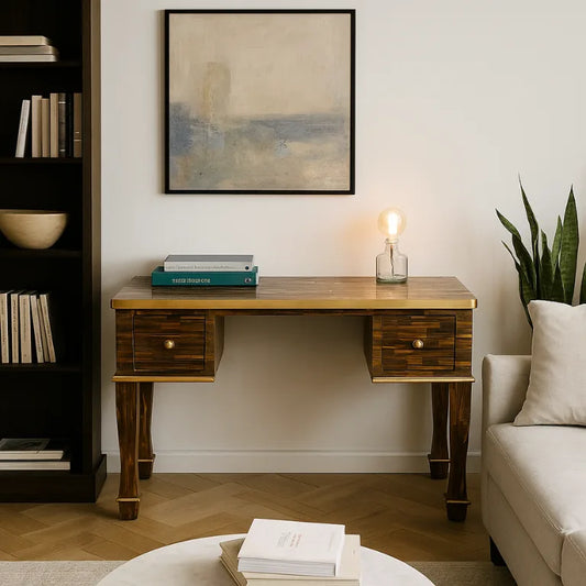 Mother of pearl desk in a room with a bookshelf, sofa, and decorative items.