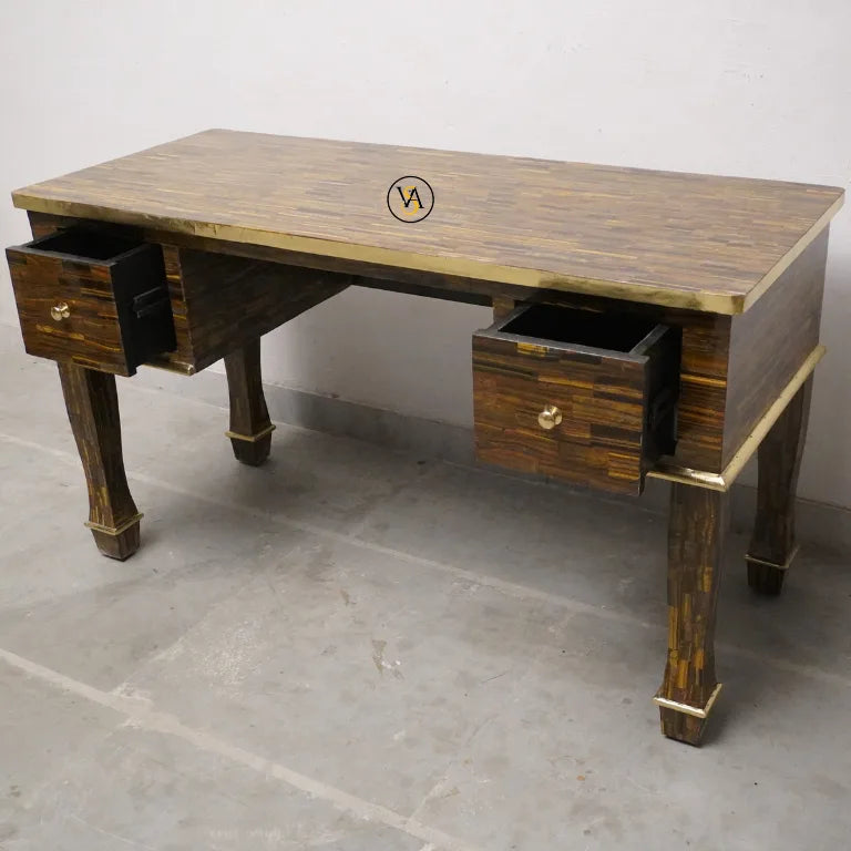 Mother of Pearl desk with drawers on a gray floor
