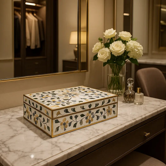 Closed Mother of Pearl Inlay Jewelry Box on Marble Dressing Table with White Roses