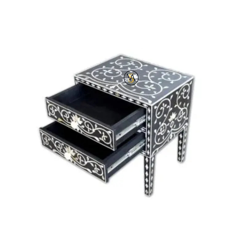 Decorative mother of pearl table with two drawers on a white background