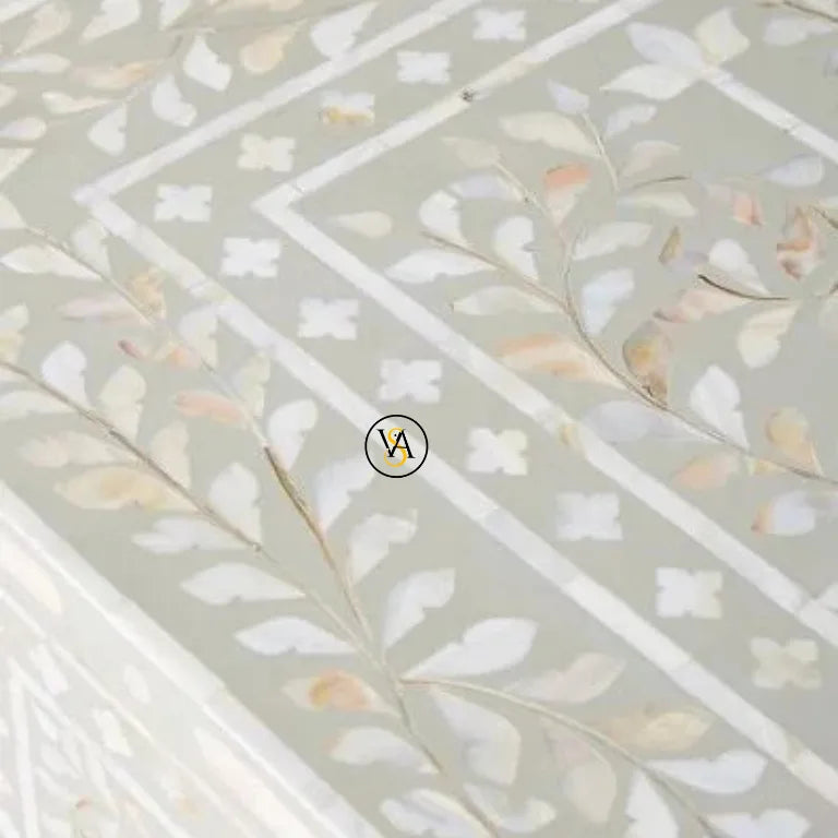 Close-up view of floral Mother of Pearl inlay on chest of drawers