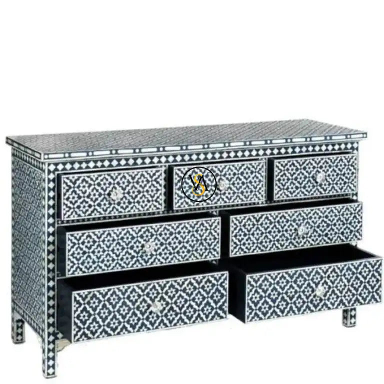Decorative bone inlay chest of drawers with geometric pattern on a white background