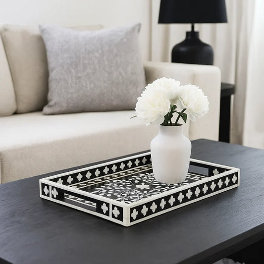 Square Decorative Bone Inlay Tray on Coffee Table with a vase of white flowers on a table in a living room setting.