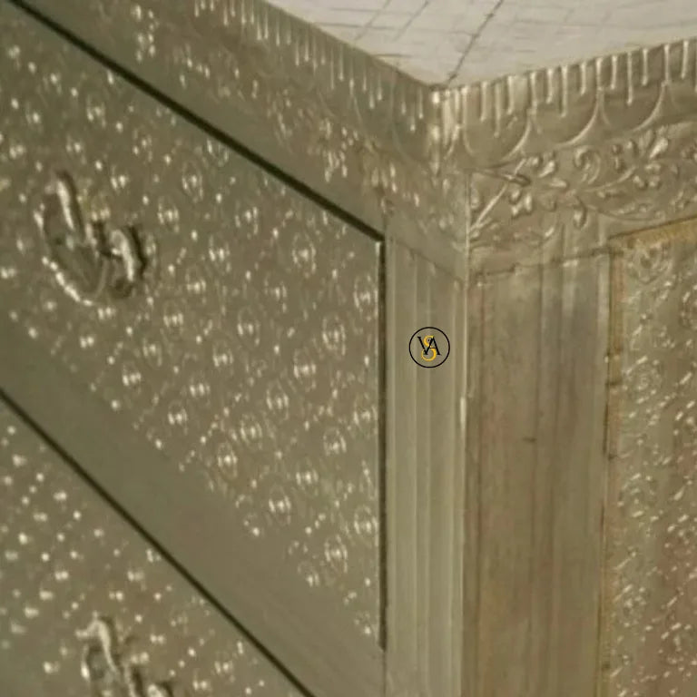 Decorative white metal chest of drawers close up view